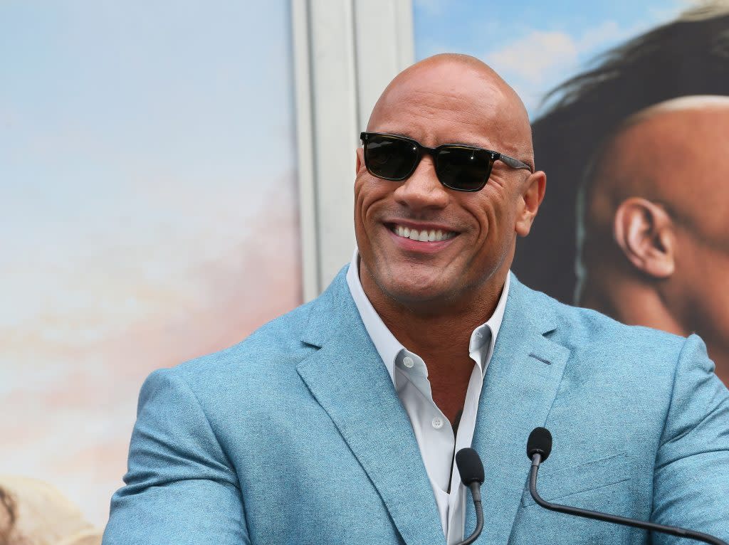 Dwayne Johnson attends a Hand and Footprint ceremony honoring Kevin Hart at the TCL Chinese Theatre IMAX on December 10, 2019 in Hollywood, California. (Photo by Jean Baptiste Lacroix/Getty Images)