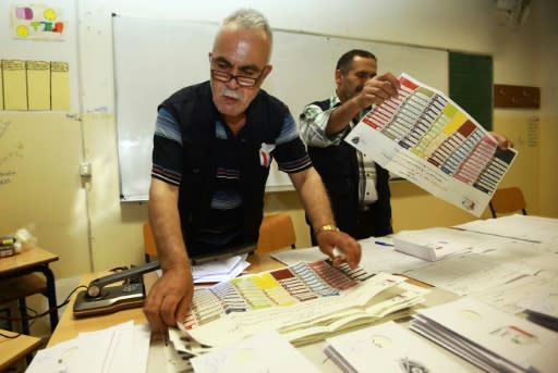 Lebanese officials count votes at a polling centre in Beirut after the country's first parliamentary elections in nine years