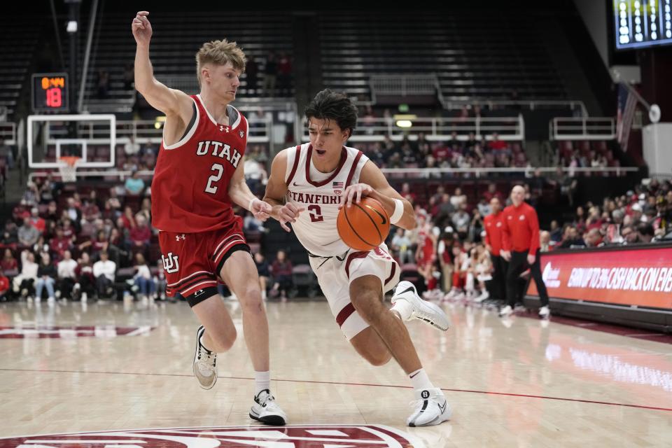Stanford guard Andrej Stojakovic, right, is defended by Utah guard Cole Bajema (2) during the second half of an NCAA college basketball game, Sunday, Jan. 14, 2024, in Stanford, Calif. | Godofredo A. Vásquez, Associated Press