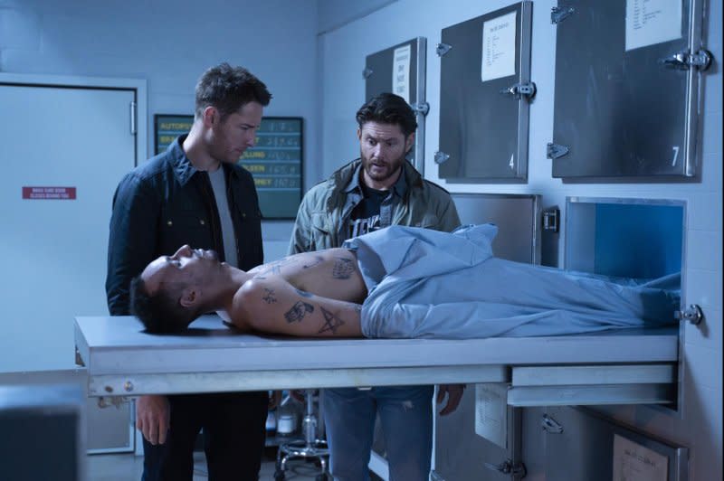 Colter (Justin Hartley, L) and Russell (Jensen Ackles) examine a body. Photo courtesy of CBS