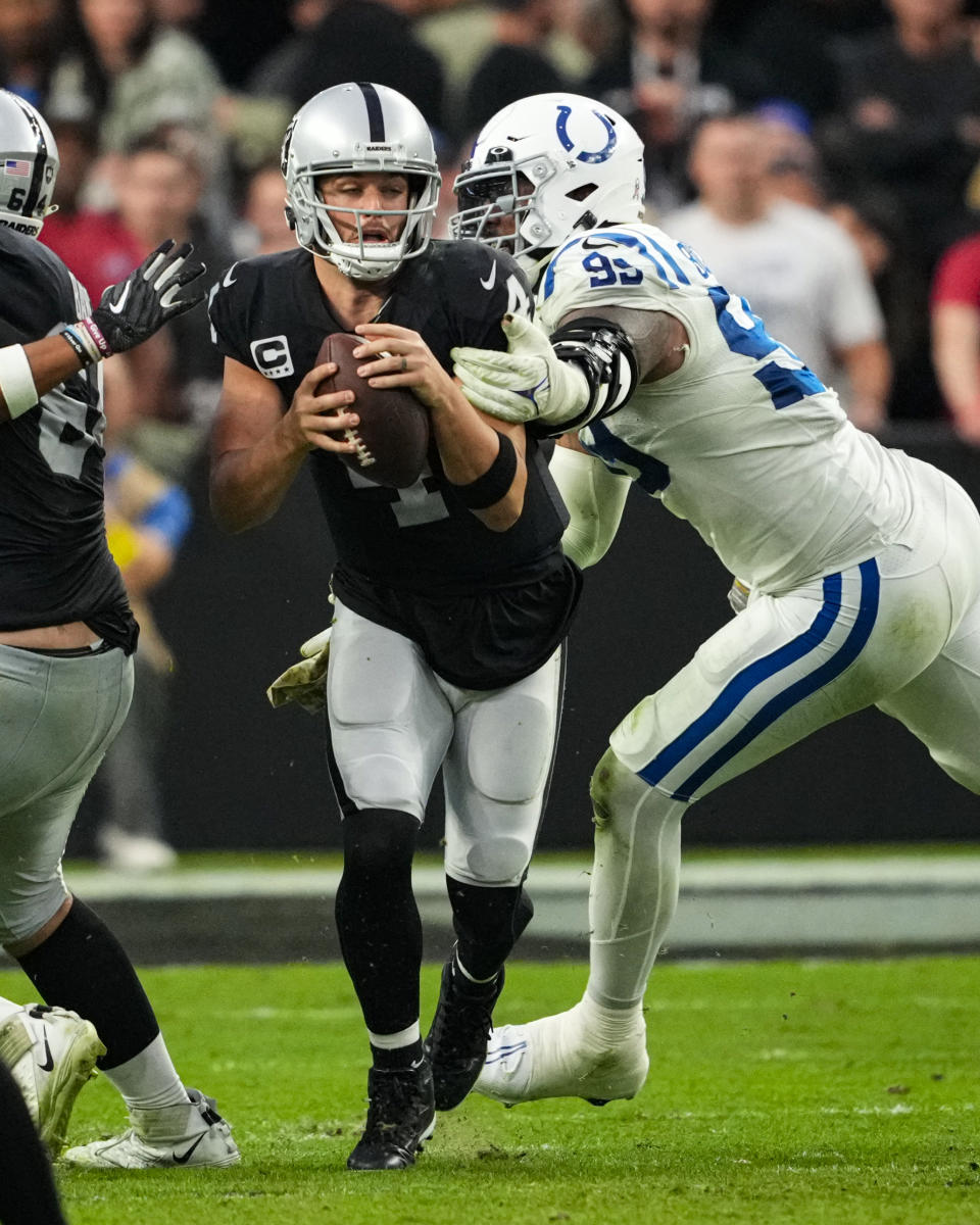 Indianapolis Colts defensive tackle DeForest Buckner (99) sacks Las Vegas Raiders quarterback Derek Carr (4) in the second half of an NFL football game in Las Vegas, Fla., Sunday, Nov. 13, 2022. (AP Photo/Matt York)