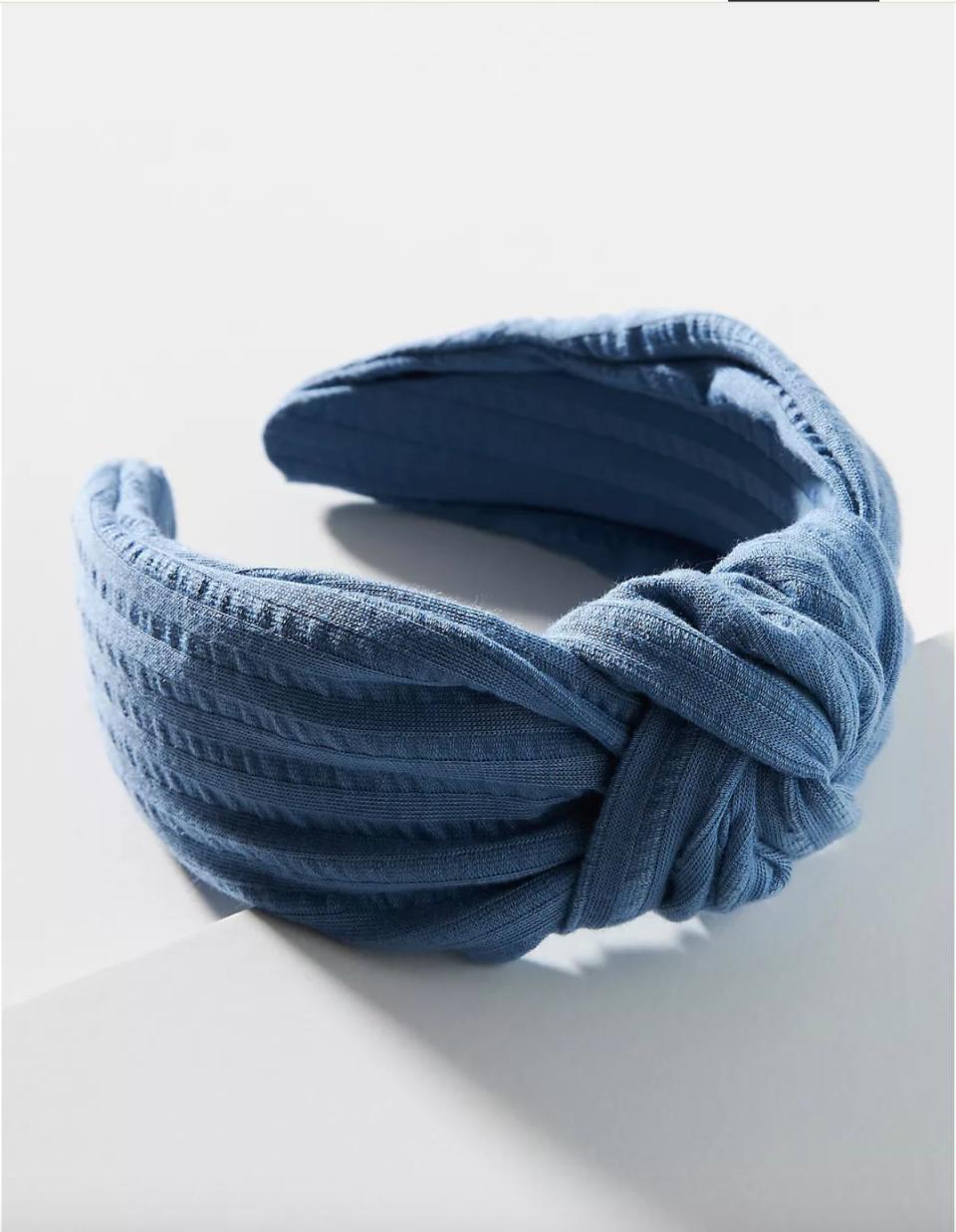 Get <a href="https://www.anthropologie.com/shop/angela-knotted-headband?color=043&amp;size=One%20Size&amp;inventoryCountry=US&amp;countryCode=US&amp;gclid=Cj0KCQiA962BBhCzARIsAIpWEL0TmQltlozBWS1eapdZsOlmzOo24zP1BQT-maElLQ26b0XW5zYi0UkaAhaaEALw_wcB&amp;gclsrc=aw.ds&amp;type=STANDARD&amp;quantity=1" target="_blank" rel="noopener noreferrer">the Anthropologie Angela knotted headband for $20</a>.