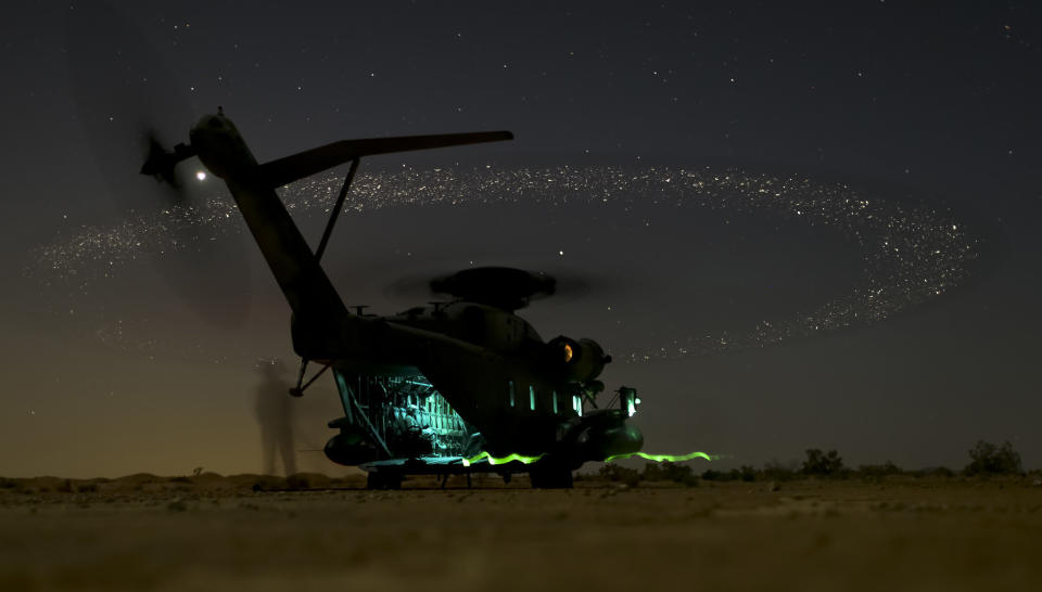 U.S. Marines assigned to Marine Aviation Weapons and Tactics Squadron One (MAWTS-1) break down a rapid ground refueling during the Weapons and Tactics Instructor Course (WTI) near 29 Palms, California, March 27, 2015. 