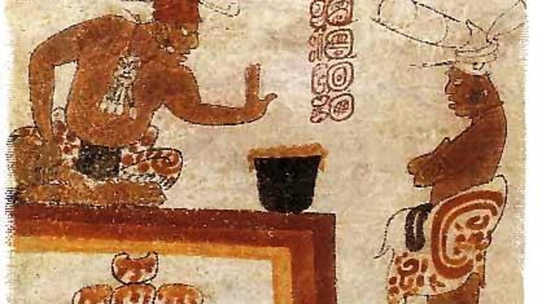 Mayan art depicting a chocolate drink