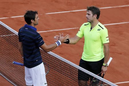 Tennis - French Open - Roland Garros - Jeremy Chardy of France vs Stan Wawrinka of Switzerland - Paris, France - 27/05/16. Stan Wawrinka shakes hands after beating Jeremy Chardy. REUTERS/Benoit Tessier