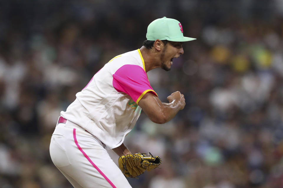 San Diego Padres starting pitcher Yu Darvish reacts after striking out Arizona Diamondbacks' Josh Rojas during the seventh inning of a baseball game Friday, July 15, 2022, in San Diego. (AP Photo/Derrick Tuskan)