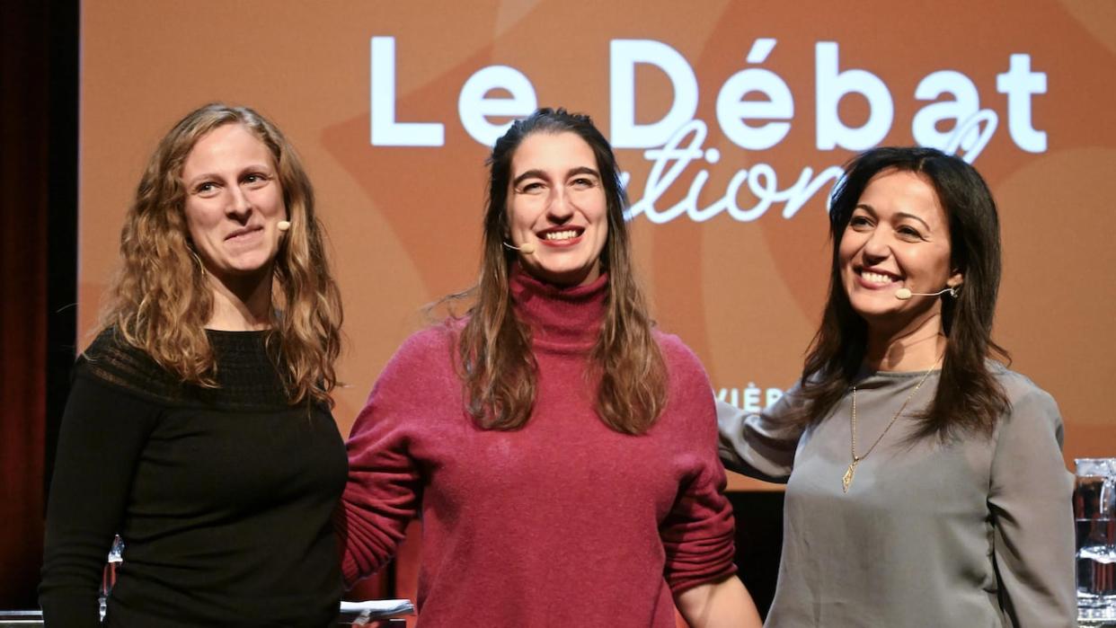 Christine Labrie, left, Émilise Lessard-Therrien, centre, and Ruba Ghazal, right, are the three candidates looking to replace Manon Massé as co-spokesperson for Québec Solidaire.  (Jacques Boissinot/The Canadian Press - image credit)