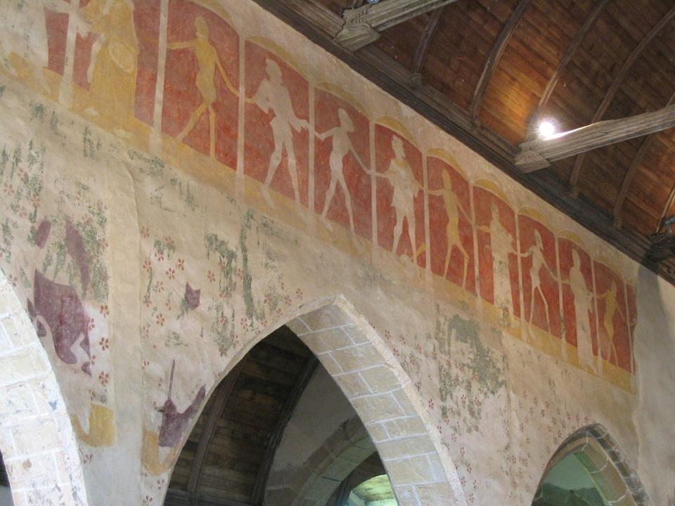 <span class="caption">Mural of the Danse Macabre from the parish church of Kermaria-en-Isquit, France (late 15th century).</span> <span class="attribution"><a class="link " href="https://upload.wikimedia.org/wikipedia/commons/6/66/KERMARIA-AN-ISQUIT_danse_macabre_5.jpg" rel="nofollow noopener" target="_blank" data-ylk="slk:Fil22plm, via Wikimedia Commons;elm:context_link;itc:0;sec:content-canvas">Fil22plm, via Wikimedia Commons</a>, <a class="link " href="http://creativecommons.org/licenses/by-sa/4.0/" rel="nofollow noopener" target="_blank" data-ylk="slk:CC BY-SA;elm:context_link;itc:0;sec:content-canvas">CC BY-SA</a></span>