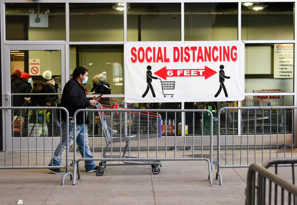 People shop ahead of Thanksgiving at Costco Wholesale in East Harlem on November 24, 2020, in New York City. (Photo by Noam Galai/Getty Images)