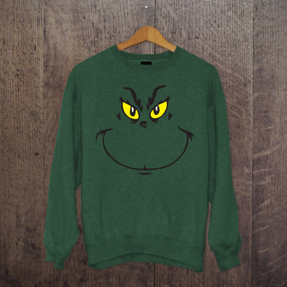 <p>£11.99,<a rel="nofollow noopener" href="https://www.etsy.com/uk/listing/256825563/the-grinch-xmas-t-shirt-hoodie-or-jumper?ga_order=most_relevant&ga_search_type=all&ga_view_type=gallery&ga_search_query=Christmas%20jumper&ref=sr_gallery_15" target="_blank" data-ylk="slk:Etsy;elm:context_link;itc:0;sec:content-canvas" class="link "> Etsy</a></p>