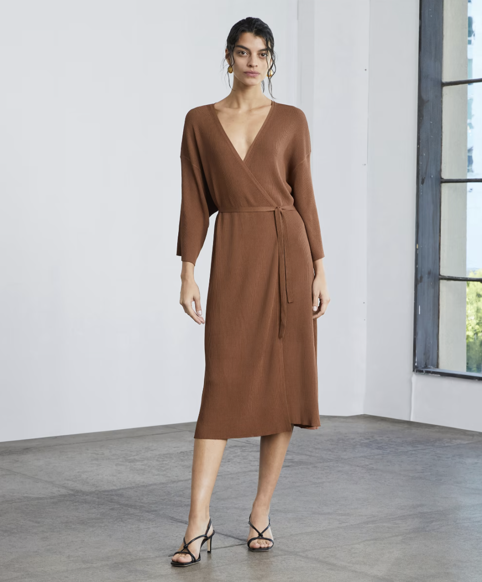 model wearing long sleeve brown midi dress, The Ribbed Wrap Midi Dress in Cocoa Brown (Photo via Everlane)