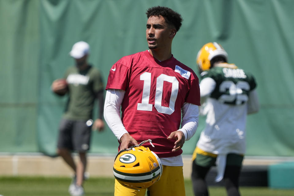Green Bay Packers' Jordan Love runs a drill during an NFL football minicamp Tuesday, June 8, 2021, in Green Bay, Wis. Aaron Rodgers’ absence from the Green Bay Packers’ minicamp means more opportunities for 2020 first-round draft pick Jordan Love, who now must prepare for the possibility he could open the season as a starting quarterback after not playing a single down his rookie year. (AP Photo/Morry Gash)