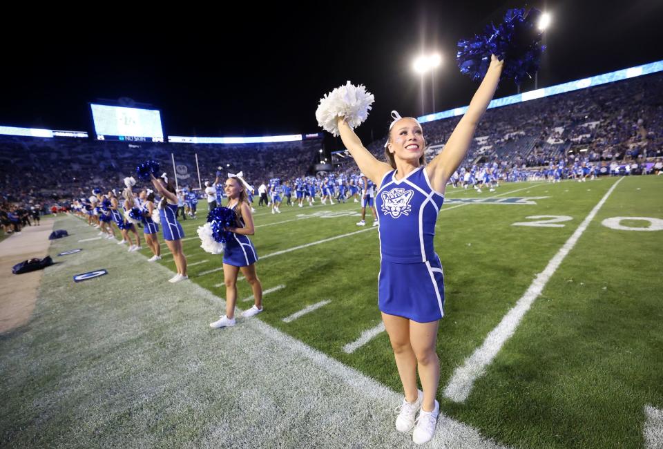 BYU cheerleaders cheer before the Brigham Young Cougars play the Cincinnati Bearcats at LaVell Edwards Stadium in Provo on Friday, Sept. 29, 2023.