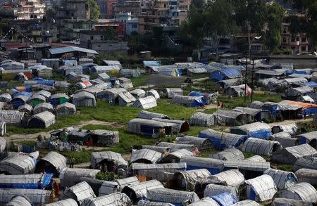 Makeshift shelters are pictured inside the displacement camps for earthquake victims at Chuchepati in Kathmandu, Nepal, September 19, 2016. Thomson Reuters Foundation/Navesh Chitrakar