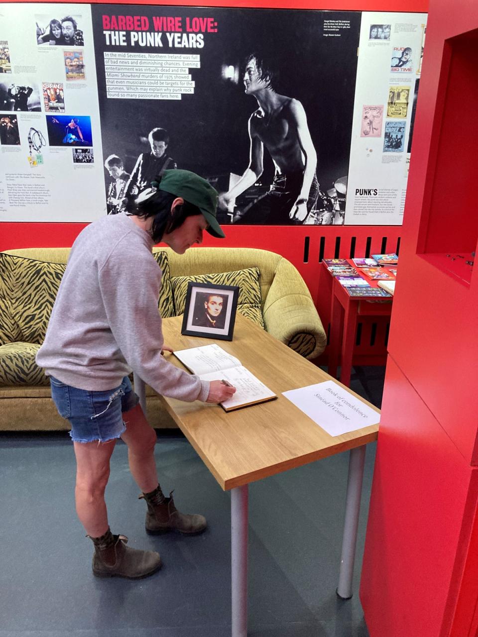 Webster signing a condolence book for O’Connor (Sue Webster)