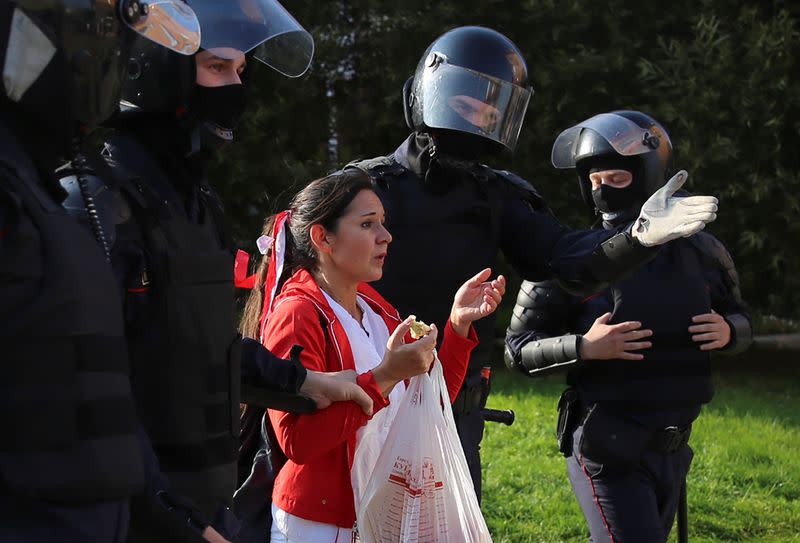 Belarusian opposition supporters hold a rally in Minsk