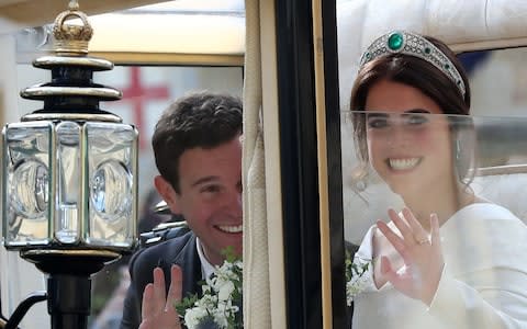 Jack Brooksbank and Princess Eugenie of York in a carriage - Credit: PA