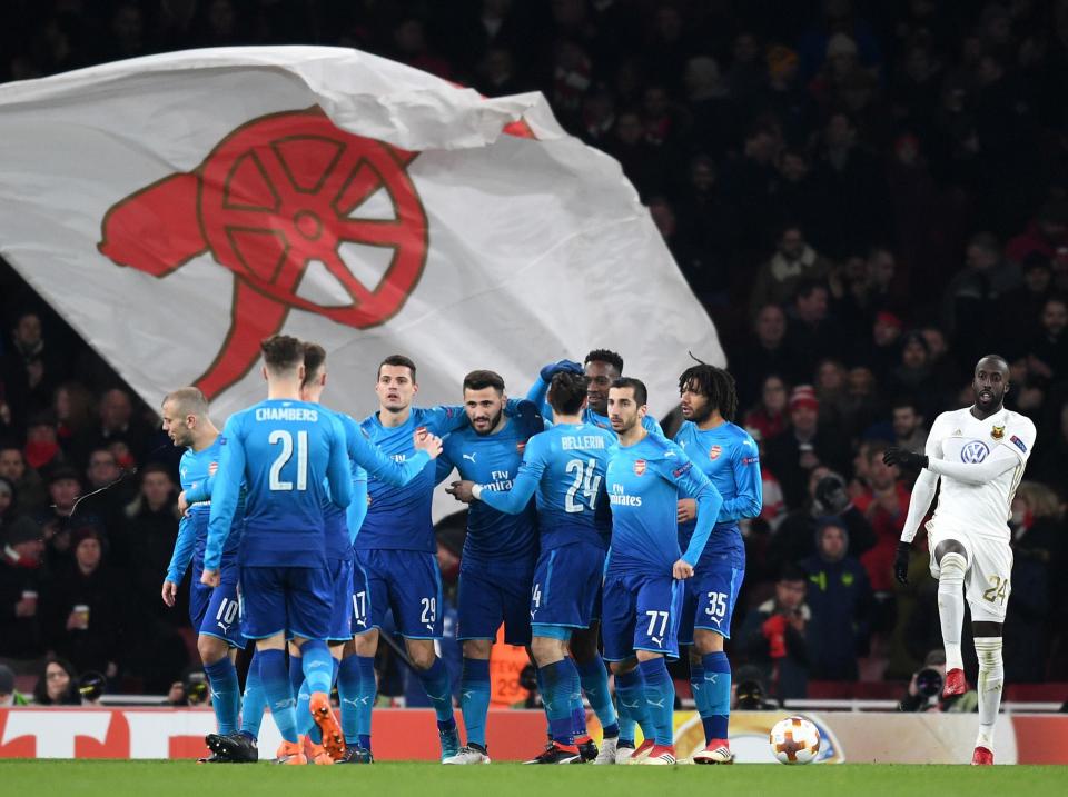 Sead Kolasinac, centre, celebrates his second-half goal: Getty Images