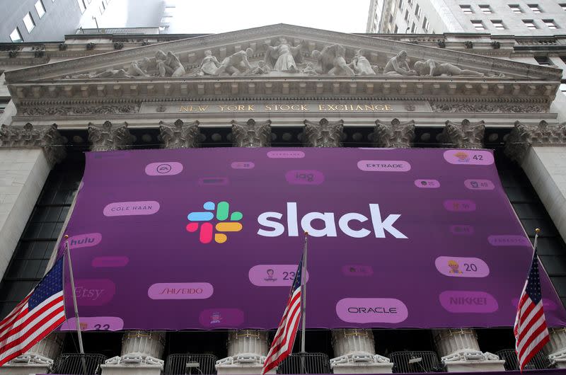 FILE PHOTO: The Slack Technologies Inc. logo is seen on a banner outside the New York Stock Exchange (NYSE) during the company's direct listing in New York