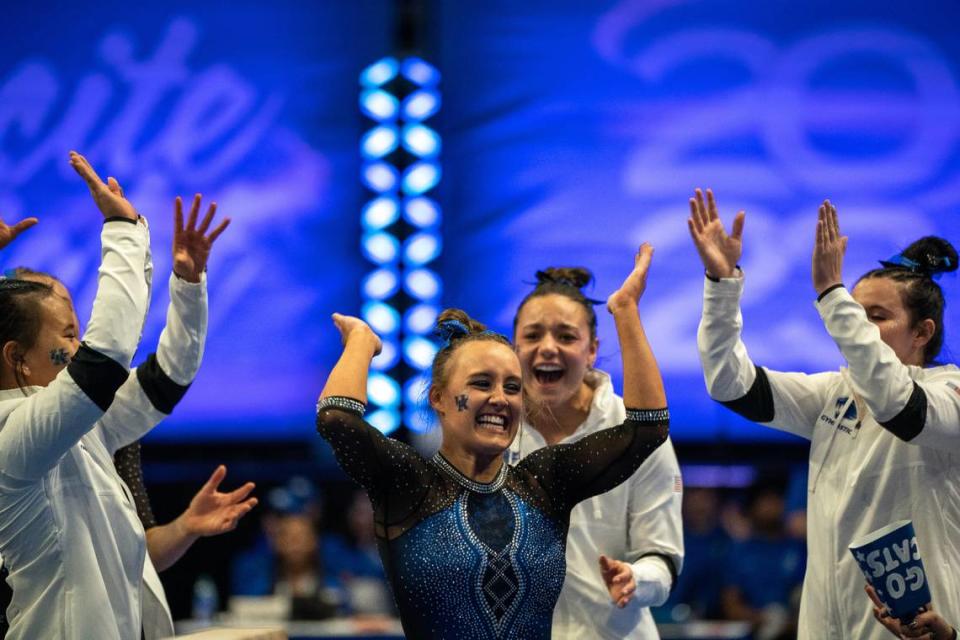 Raena Worley and her UK teammates celebrate during last year’s Excite Night win over No. 10 LSU at Rupp Arena.