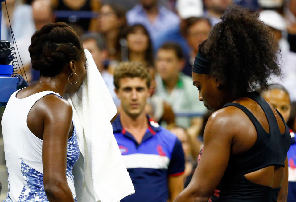 NEW YORK, NY - SEPTEMBER 08:  Serena Williams (R) of the United States talks to Venus Williams of the United States during their Women's Singles Quarterfinals match on Day Nine of the 2015 US Open at the USTA Billie Jean King National Tennis Center on September 8, 2015 in the Flushing neighborhood of the Queens borough of New York City.  (Photo by Al Bello/Getty Images)