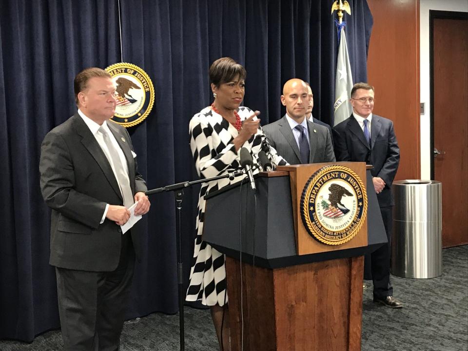 U.S. Attorney Dawn Ison, center, speaks during a news conference in downtown Detroit on July 10, 2023, after a former Warren police officer is charged with a federal civil rights violation after assaulting a suspect in the city lockup June 13, 2023. She appears with Macomb County Prosecutor Peter Lucido, left, and Devin Kowalski, right, who is acting special agent in charge of the FBI in Michigan.