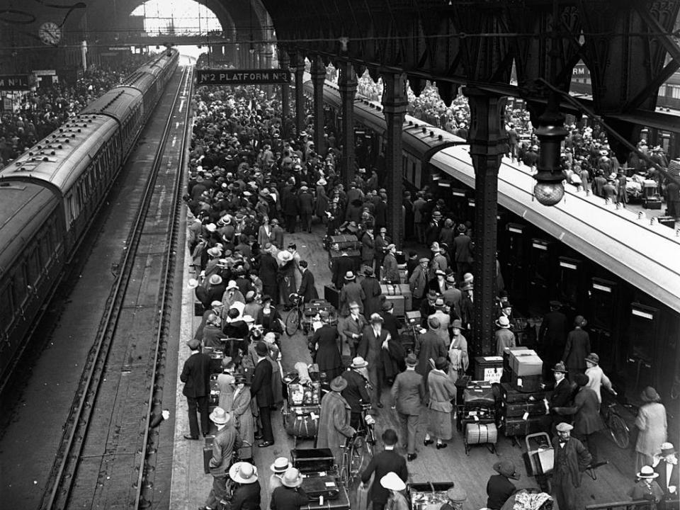 Holidaymakers waiting for the Cornish Riviera express train at Paddington Station, London, in 1924.