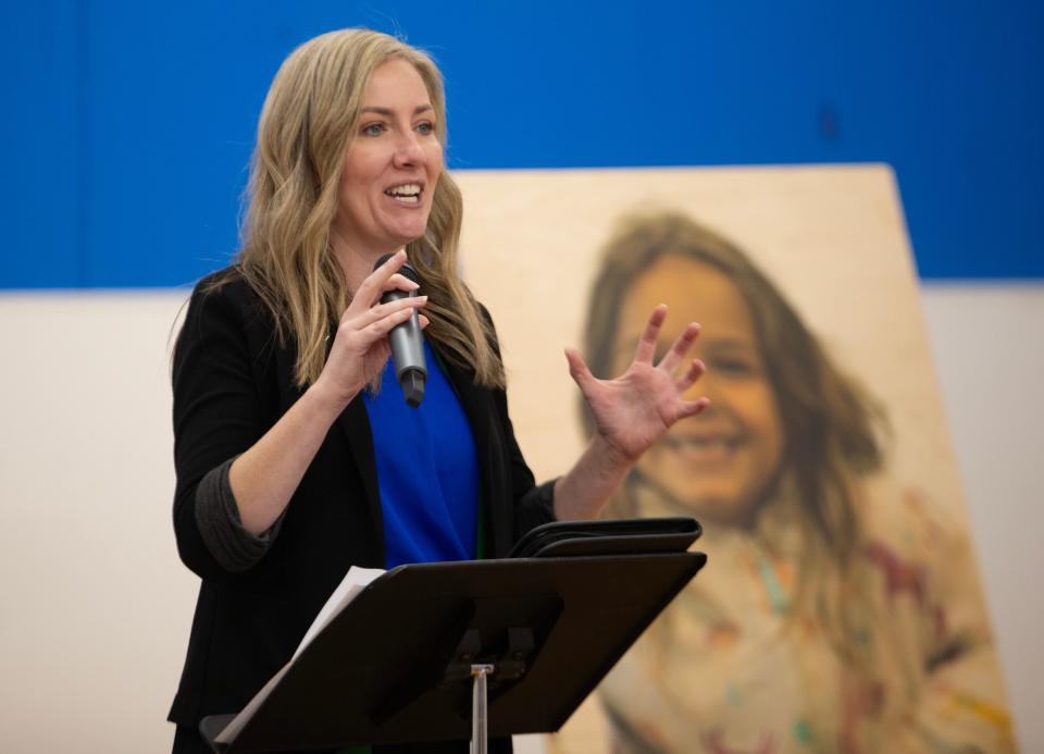 Executive Director Shelly Williams welcomes visitors to the Boys and Girls Club of Emerald Valley at Westmorland Park in Eugene during a reopening ceremony on Wednesday.