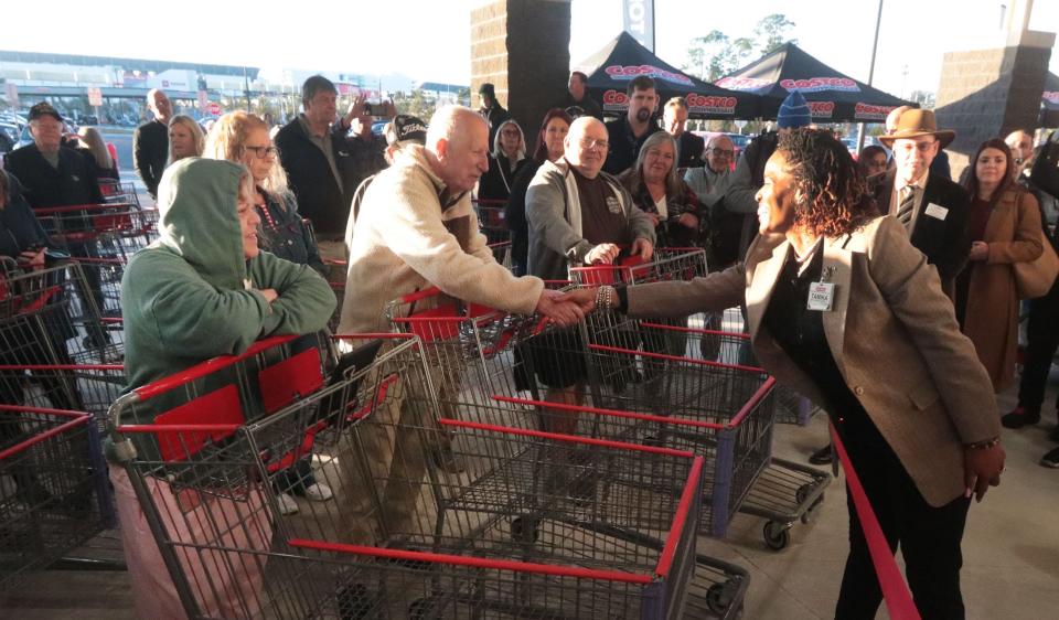 Shoppers eagerly await the grand opening of the new Costco Wholesale at One Daytona on Feb. 22 in Daytona Beach.