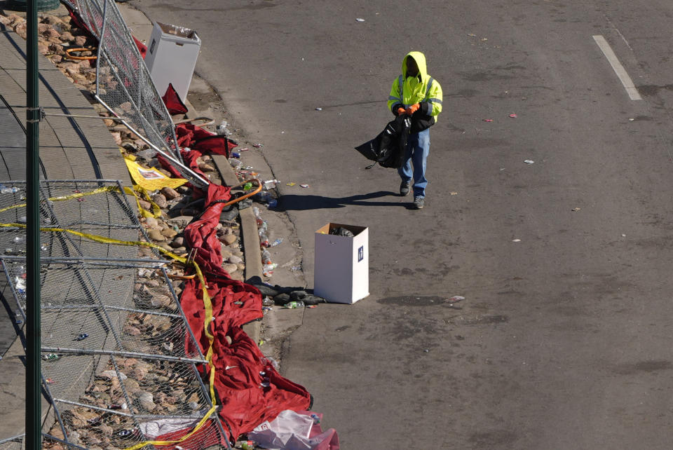 A worker cleans outside of Union Station Thursday, Feb. 15, 2024, in Kansas City, Mo. The venue was the site of a mass shooting Wednesday after a rally celebrating the Kansas City Chiefs winning the NFL Super Bowl 58 football game. (AP Photo/Charlie Riedel)