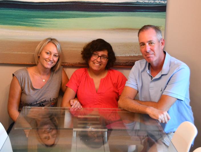 Wendy Johnson and Peter Chunka with their daughter Jenny Johnson-Chunka (center). The Melbourne Beach family is moving out of Florida because of the effects of some of the legislation that Gov. DeSantis has signed. 