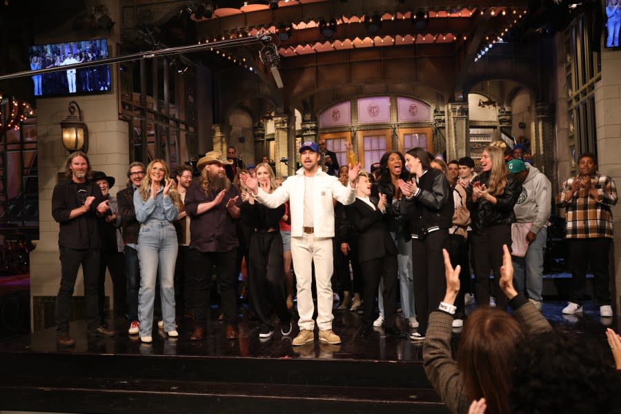 Morgane Stapleton, musical guest Chris Stapleton, surprise guest Emily Blunt, host Ryan Gosling, surprise guest Kate McKinnon, and surprise guest Caitlin Clark (with Iowa teammates Jada Gyamfi, Gabbie Marshall and Kate Martin surrounding her) during the Goodnights & Credits on Saturday, April 13, 2024. (Photo by: Will Heath/NBC via Getty Images)