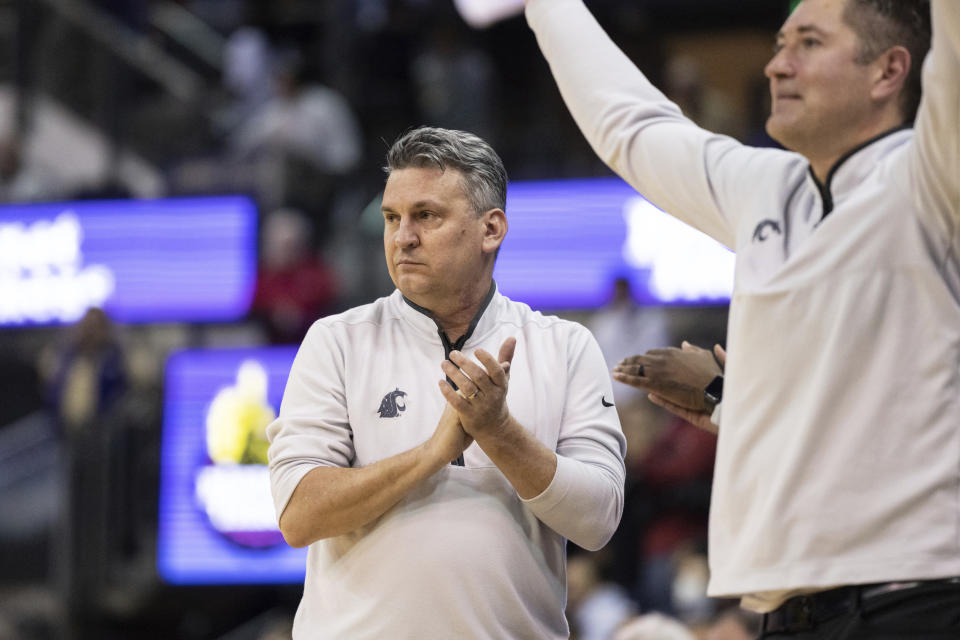 Washington State coach Kyle Smith celebrates during the second half of the team's NCAA college basketball game against Washington, Thursday, March 2, 2023, in Seattle. Washington State won 93-84. (AP Photo/Stephen Brashear)