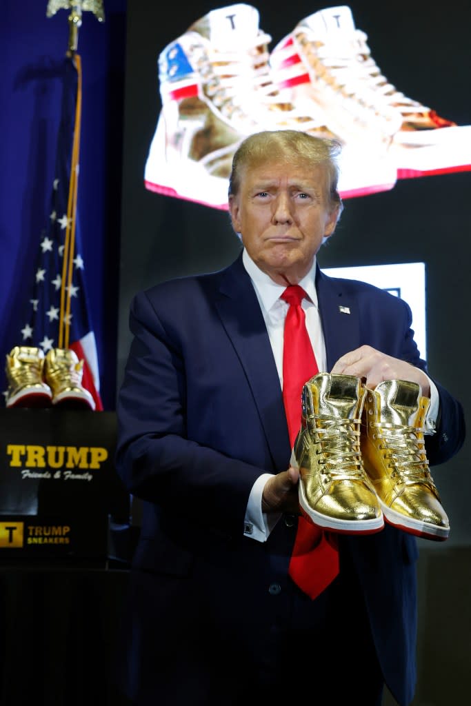 The real Donald Trump announced his gold-plated shoe line earlier this month during a surprise appearance at Sneaker Con in Philadelphia. Chip Somodevilla/Getty Images