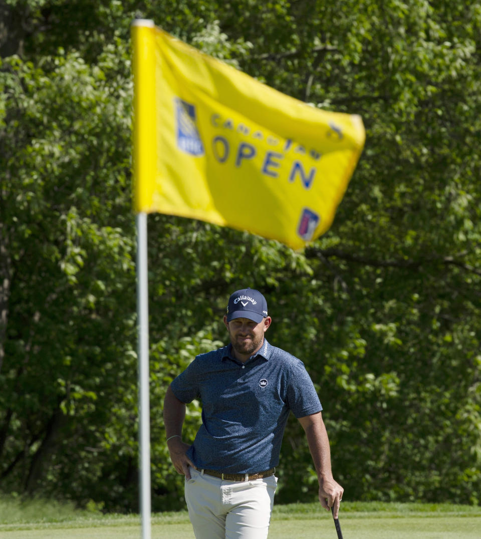 Scott Brown waits his turn to play on the 8th green during the second round of the Canadian Open golf tournament in Ancaster, Ontario, Friday, June 7, 2019. (Adrian Wyld/The Canadian Press via AP)