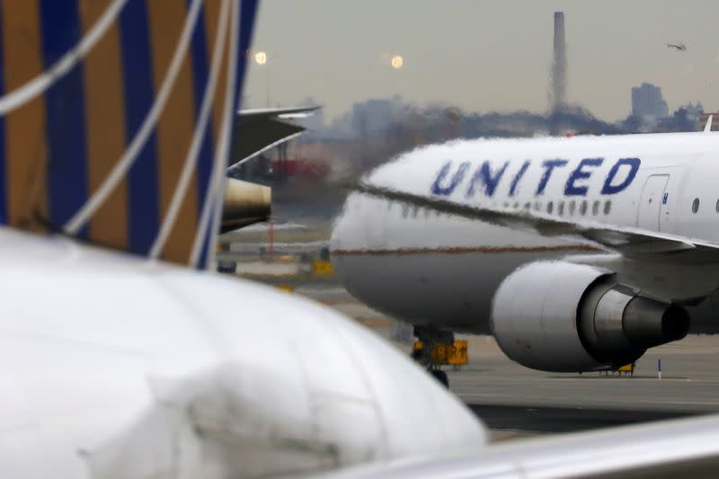 A United Airlines passenger jet taxis at Newark Liberty International Airport