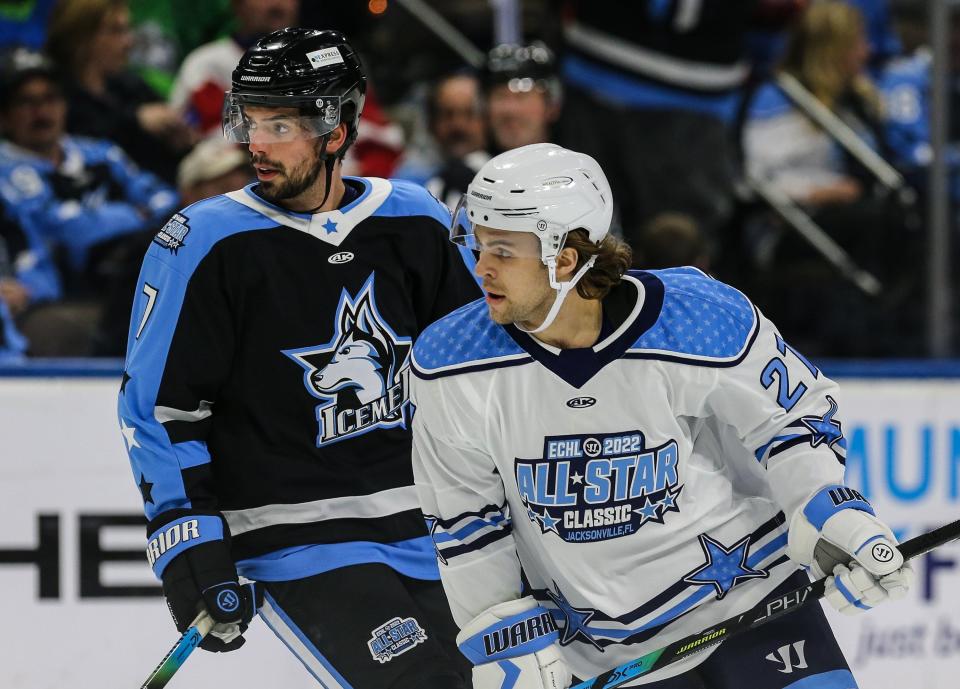 Jacksonville Icemen defenseman Kyle McKenzie (7) and All-Stars forward Liam Pecararo (27), right, wait for a play to develop during the 2022 ECHL All-Star Classic.