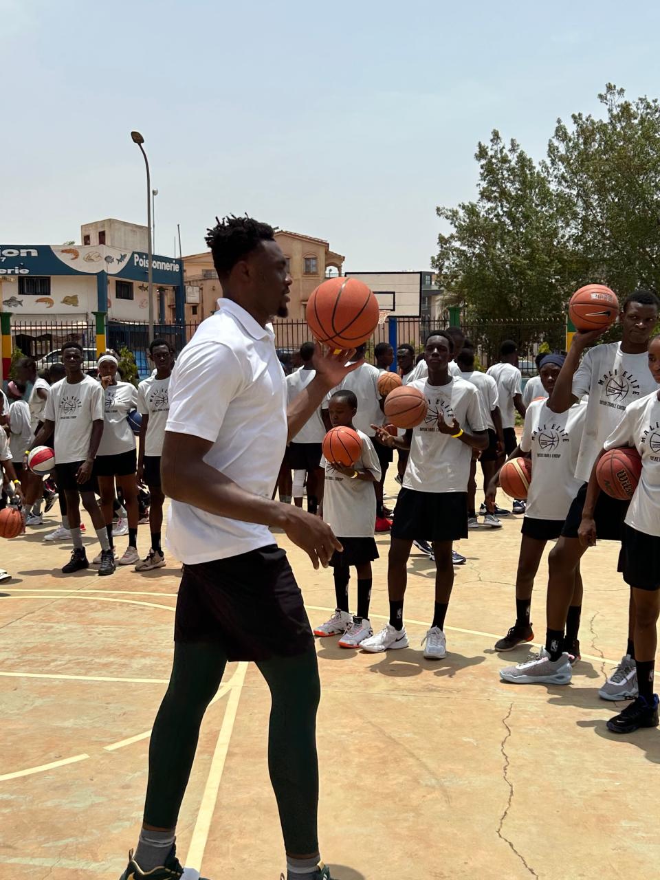 Michigan State's Mady Sissoko helped run a two-day camp for 250 boys and girls ages 5-14 in Bamako, Mali, the only city in the country with an indoor basketball facility. They also used outdoor courts nearby. Sissoko and his fellow countrymen worked with 35 kids apiece on a half-court.