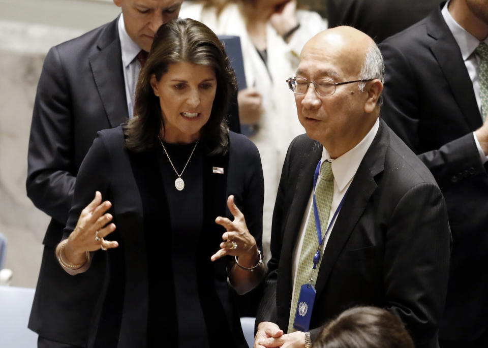 U.S. Ambassador Nikki Haley, left, talks with Japan's Ambassador Koro Bessho in the United Nations Security Council, Monday, Sept. 17, 2018, at U.N. headquarters. (AP Photo/Richard Drew)