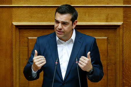 Greek Prime Minister Alexis Tsipras addresses lawmakers during a parliamentary session about government's negotiations with country's creditors in Athens, Greece, May 23, 2018. REUTERS/Costas Baltas