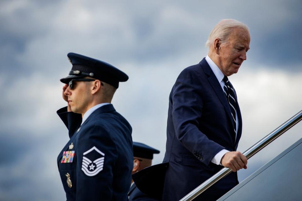 President Joe Biden, pictured boarding Air Force One to Delaware on Friday, will now return to Washington, DC to consult with his national security team (AFP via Getty Images)