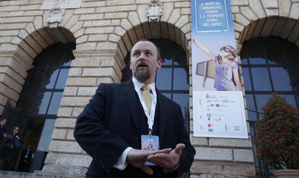 Joseph Grabowski arrives to the World Congress of Families, in Verona, Italy, Saturday, March 30, 2019. A congress in Italy under the auspices of a U.S. organization that defines family as strictly centering around a mother and father has made Verona — the city of Romeo and Juliet — the backdrop for a culture clash over family values, with a coalition of civic groups mobilizing against what they see as a counter-reform movement to limit LGBT and women's rights. (AP Photo/Antonio Calanni)