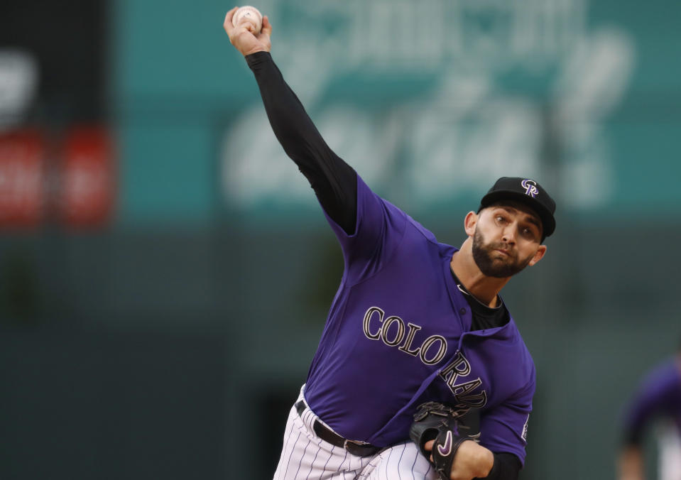 Colorado Rockies starting pitcher Tyler Chatwood delivers a pith to San Diego Padres' Manuel Margot in the first inning of a baseball game, Monday, April 10, 2017, in Denver. (AP Photo/David Zalubowski)