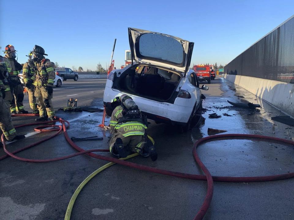 A Tesla Model S caught fire on the eastbound highway at Sunrise Blvd on January 28, 2023.