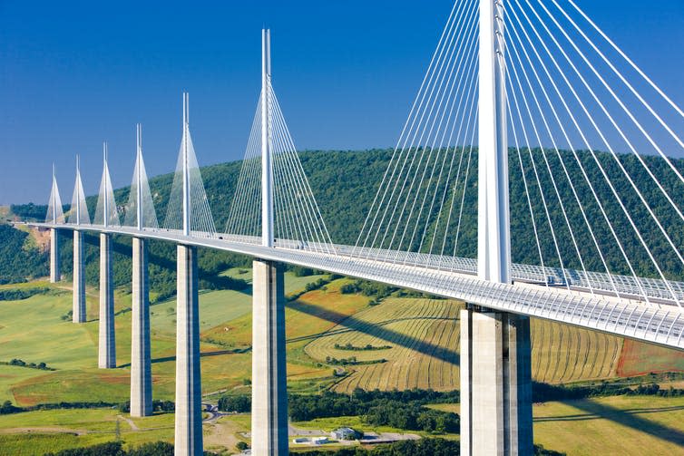 A large suspension bridge across a valley