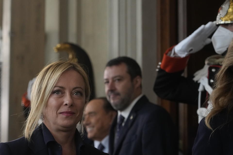 Brothers of Italy's leader Giorgia Meloni arrives to meet the journalists at the Quirinale Presidential Palace after a meeting with Italian President Sergio Mattarella as part of a round of consultations with party leaders to try and form a new government, in Rome, Friday, Oct. 21, 2022. (AP Photo/Gregorio Borgia)