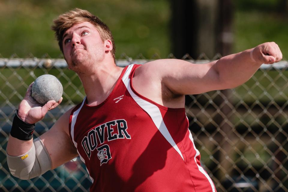 Dover's Ryan McVicker competes in shot put  during  the Tuscarawas County Classic Monday at Woody Hayes Quaker Stadium in New Philadelphia.