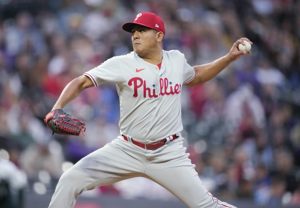 Philadelphia Phillies starting pitcher Ranger Suarez works against the Colorado Rockies during the first inning of a baseball game Saturday, May 13, 2023, in Denver. (AP Photo/David Zalubowski)