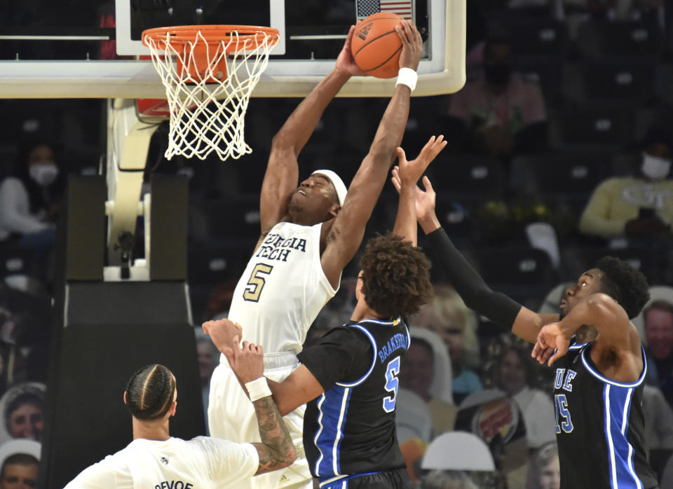 Georgia Tech forward Moses Wright (5) grabs a rebound during the first half of the team's NCAA college basketball game against Duke on Tuesday, March 2, 2021, in Atlanta. (Hyosub Shin/Atlanta Journal-Constitution via AP)