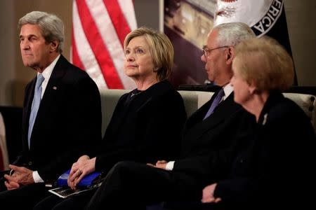 U.S. Secretary of State John Kerry (L) and former secretaries of State Hillary Clinton, Colin Powell and Madeleine Albright (R) attend a reception celebrating the completion of the U.S. Diplomacy Center Pavilion in Washington, U.S., January 10, 2017. REUTERS/Yuri Gripas